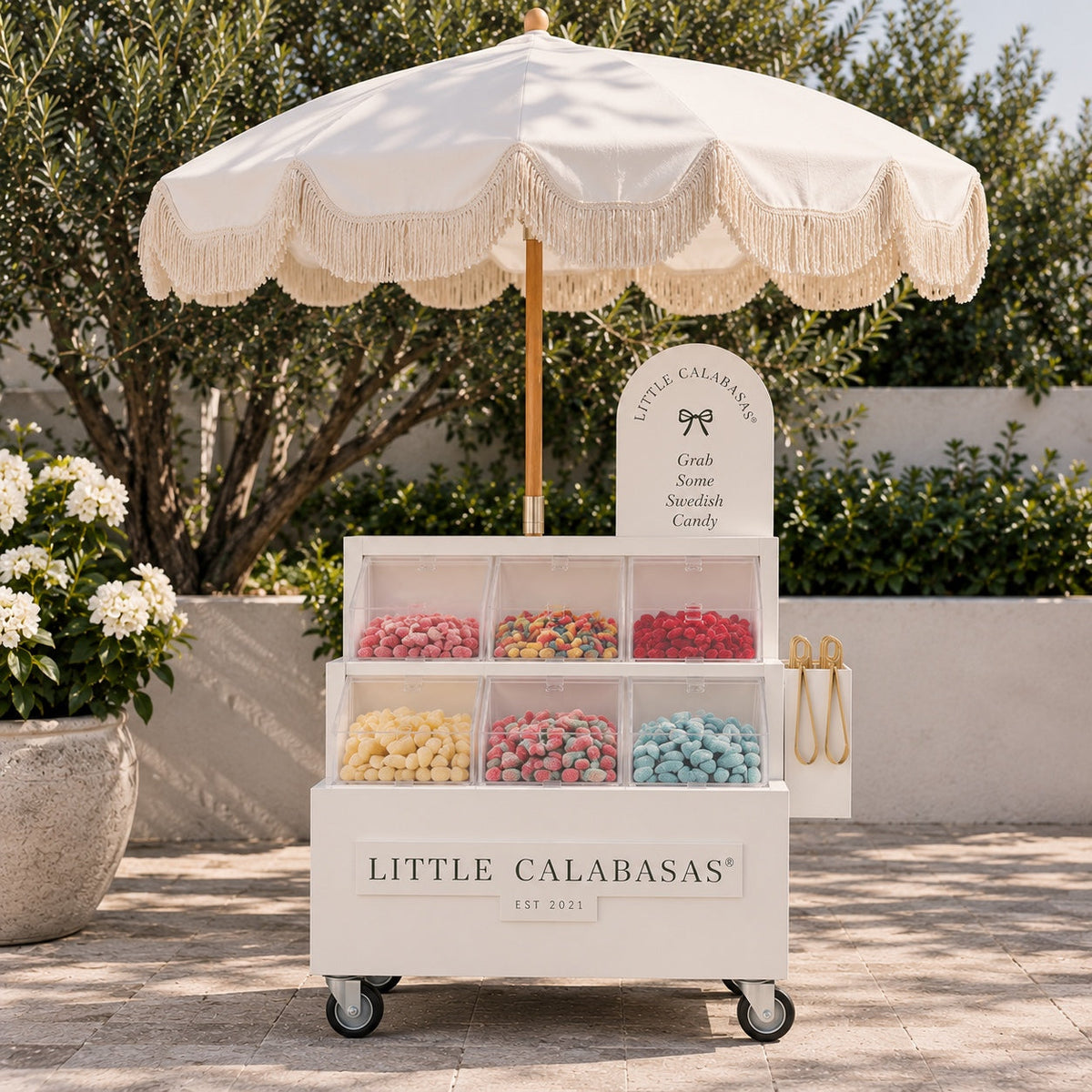 Little Calabasas Petite Treat Cart with six lidded candy vessels and decorative umbrella