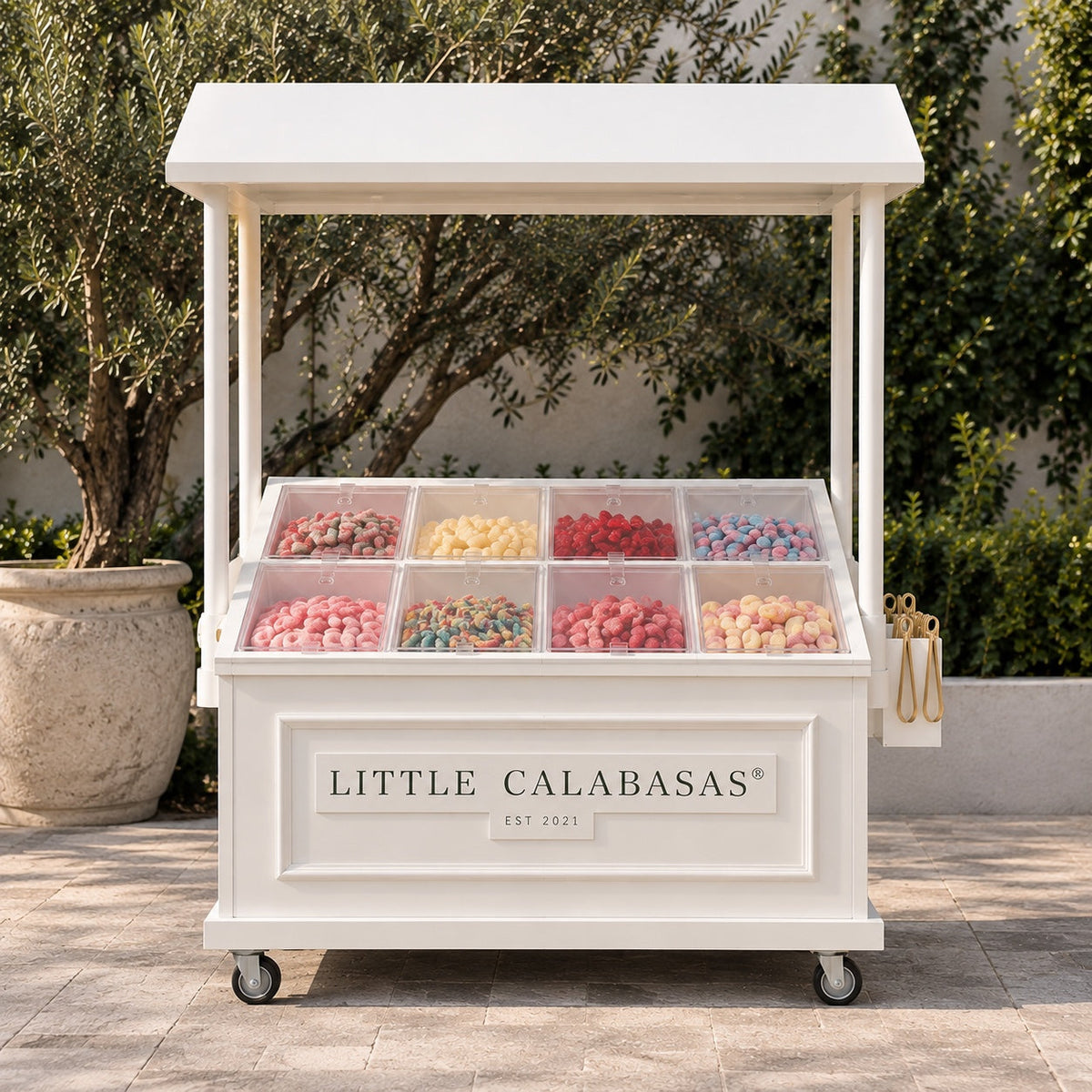 Little Calabasas Signature Treat Cart with eight clear candy vessels and a solid white metal canopy